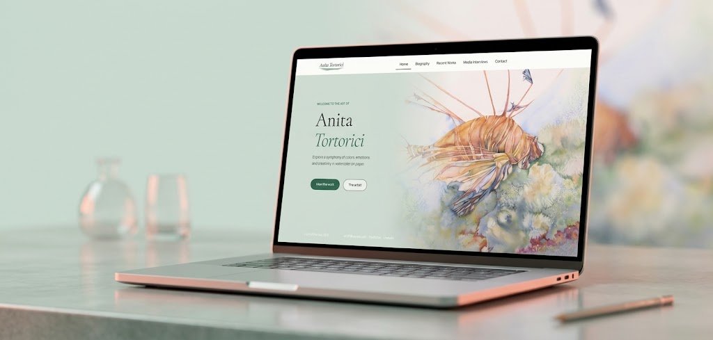 Anita Tortorici art portfolio website homepage shown on a laptop
